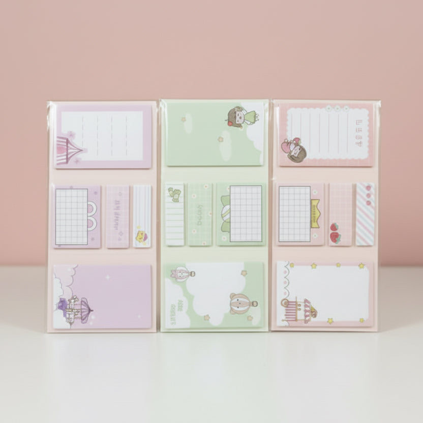 Set of colorful sticky notes with various designs on a white surface.