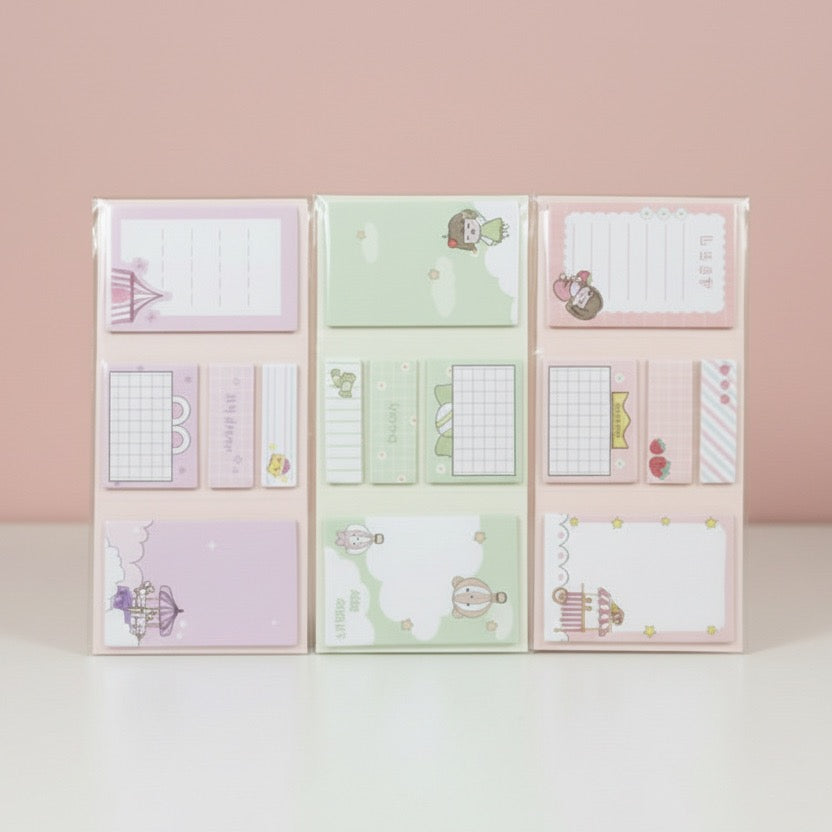 Set of colorful sticky notes with various designs on a pink background