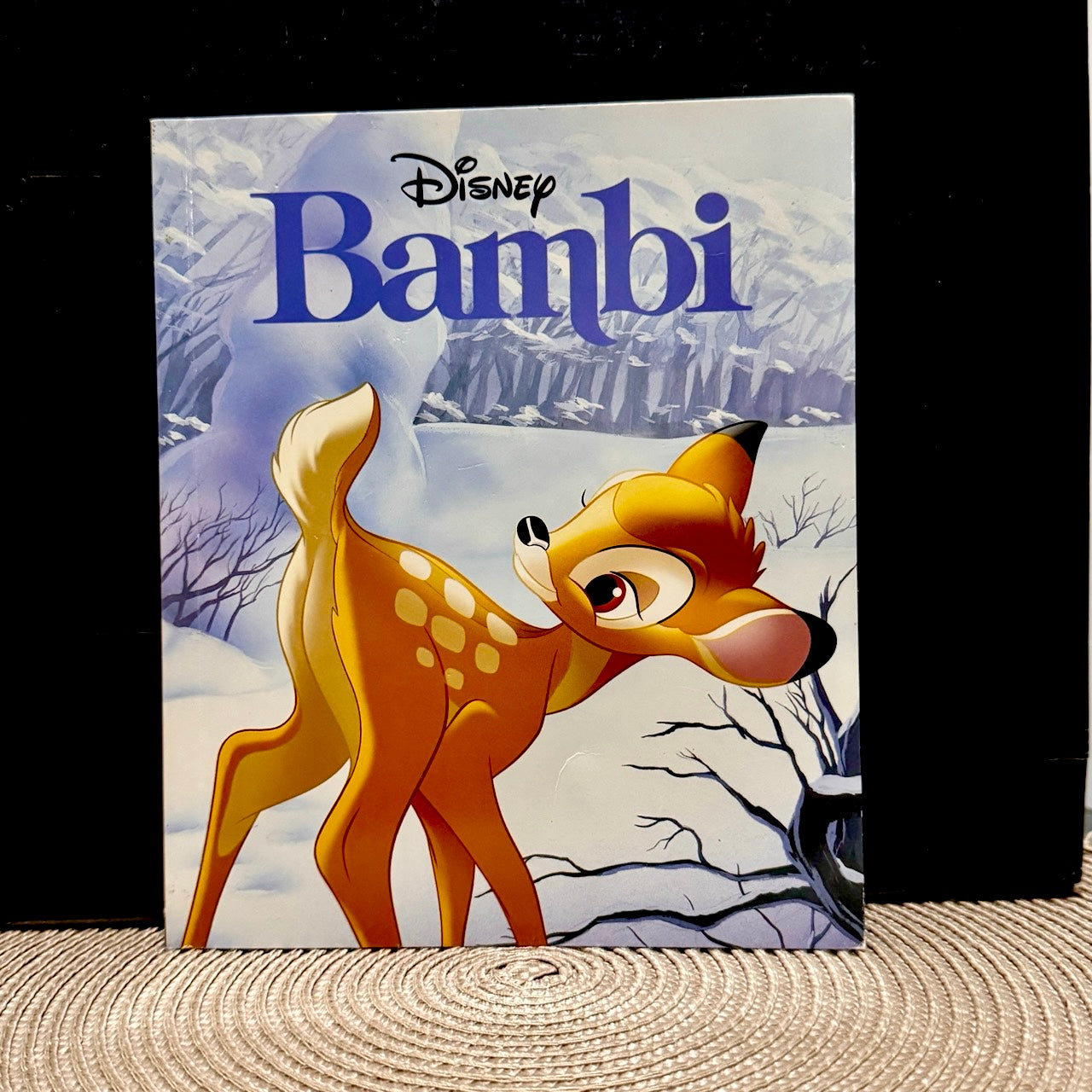 Disney Bambi book cover with a deer in a snowy landscape
