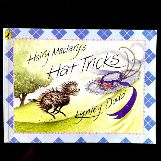 Book cover of 'Hairy Maclary's Hat Tricks' by Lynley Dodd with a dog and hat illustration.