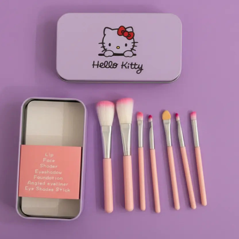 Makeup brush set with 'Hello Kitty' tin on a purple background
