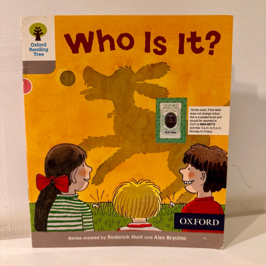 Book cover of 'Who Is It?' by Oxford with two children and a dog's shadow illustration on a orange background.