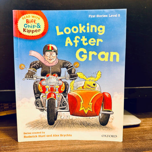 Book titled 'Looking After Gran' featuring a grandma on a motorcycle with a dog in the sidecar.