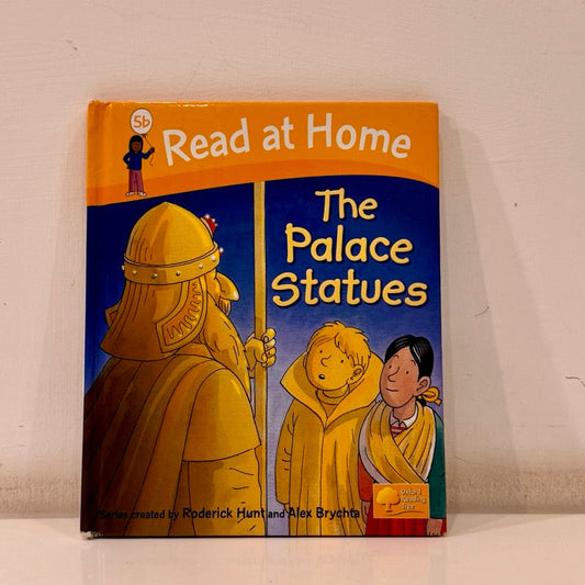 Book titled 'The Palace Statues' by Oxford Reading Tree on a beige background