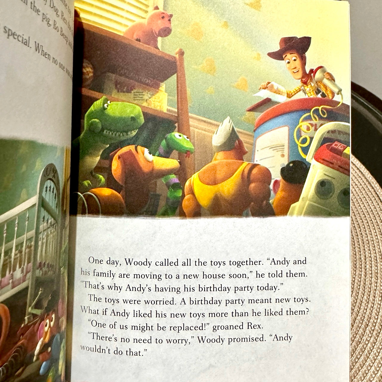 Illustrated book page with toy characters and text, featuring a scene from an animated movie.