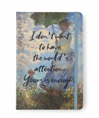 Notebook with a painting of a woman holding an umbrella and text on the cover