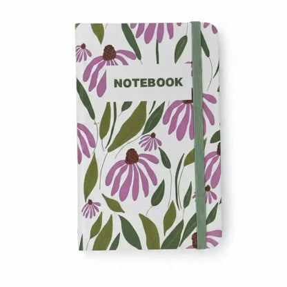 Floral notebook with a green strap on a white background