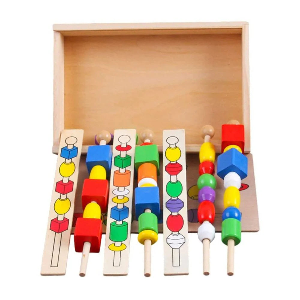 Colorful wooden pegboard toy with various shapes and colors on sticks, inside a wooden box.