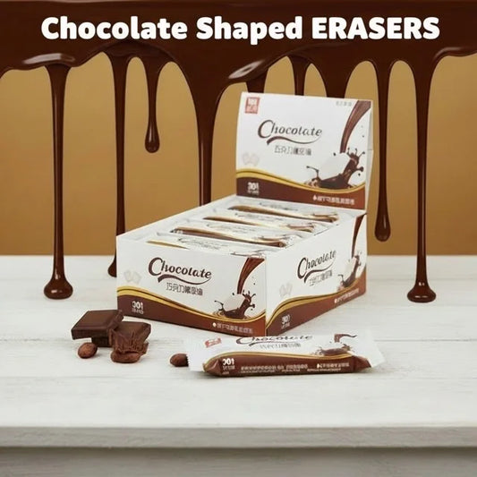 Chocolate-shaped erasers with packaging on a table with chocolate drizzle