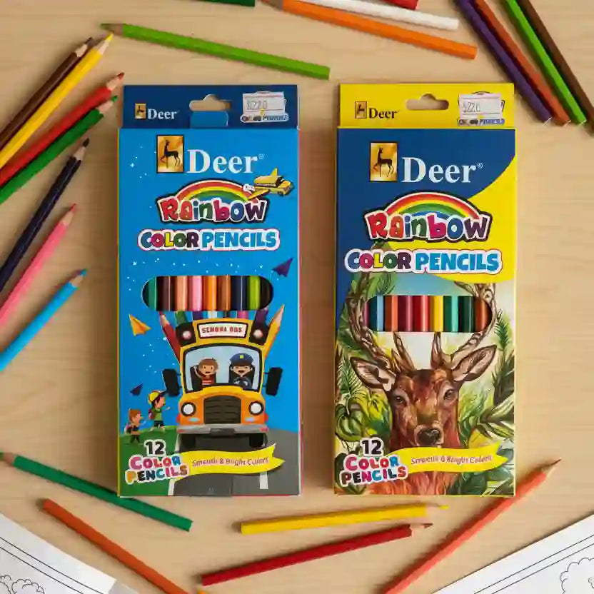 Two packages of Deer Rainbow Color Pencils on a wooden surface with colorful pencils scattered around.