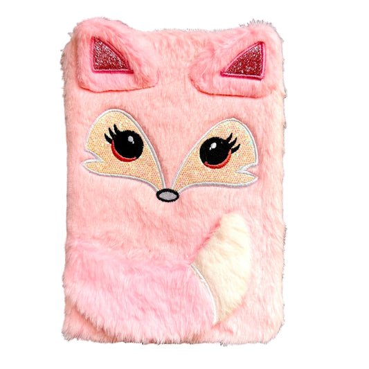 Pink fluffy fox-shaped journal with glittery eyes on a white background