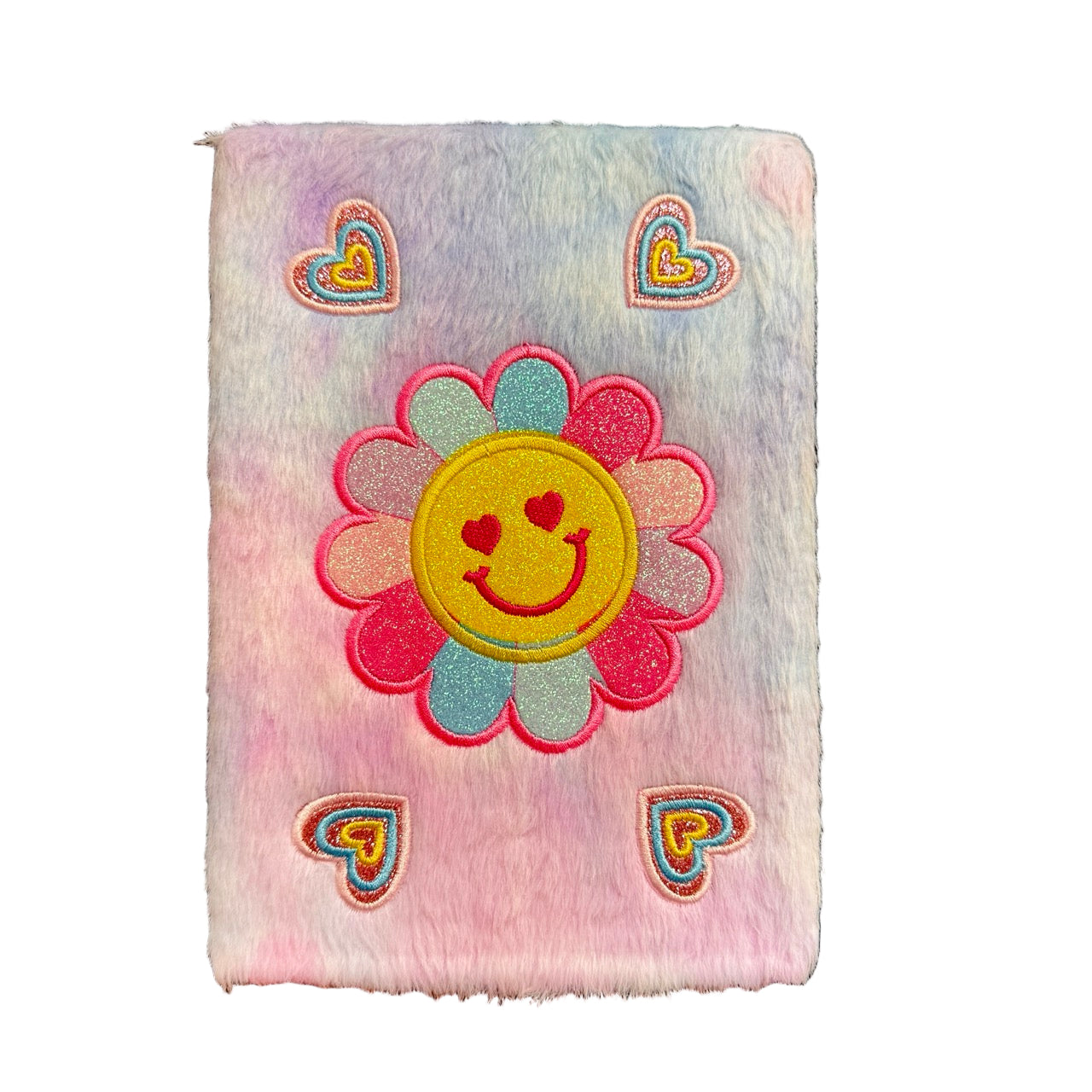 Fluffy pink journal with a smiley face flower design and heart shapes on a white background