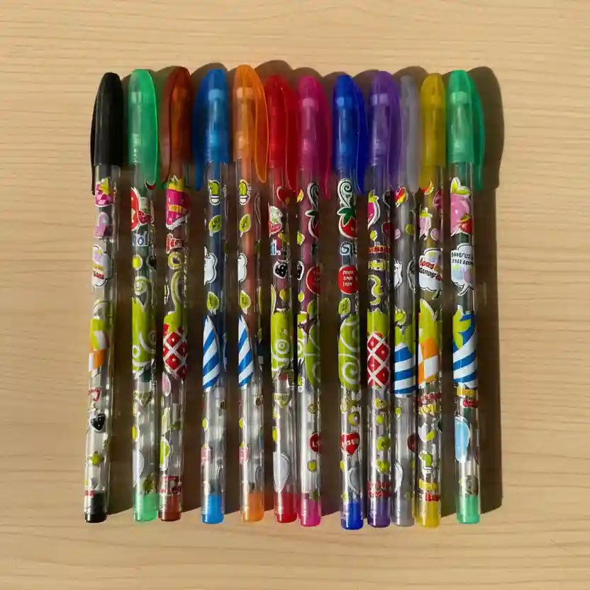 Assorted colorful pens with decorative patterns on a wooden surface