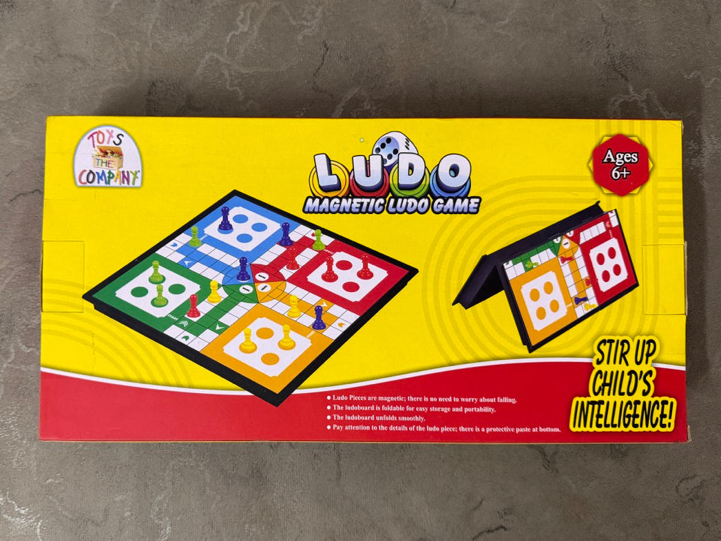 Ludo game box on a gray surface