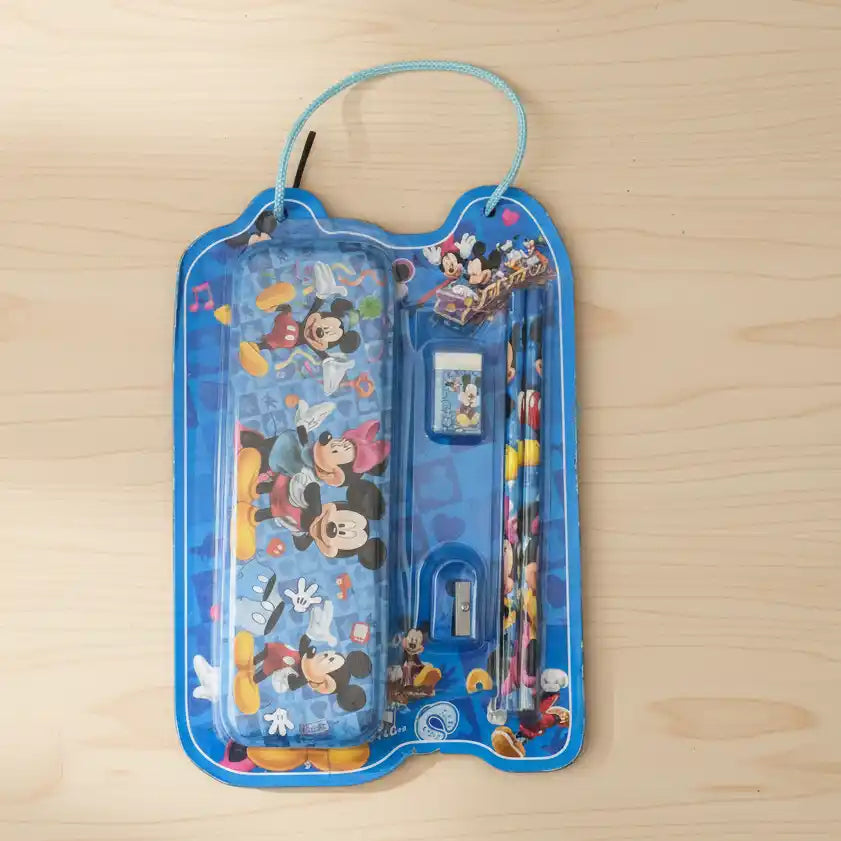Children's stationery set with Mickey Mouse design in a blue case on a wooden surface