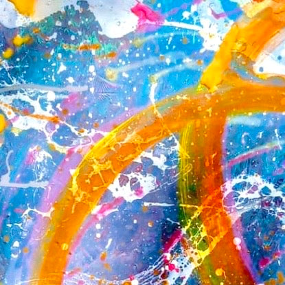 Abstract artwork with colorful splashes on a blue background