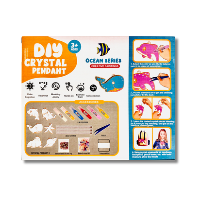 Packaging of a DIY crystal pendant kit with ocean-themed designs on a white background