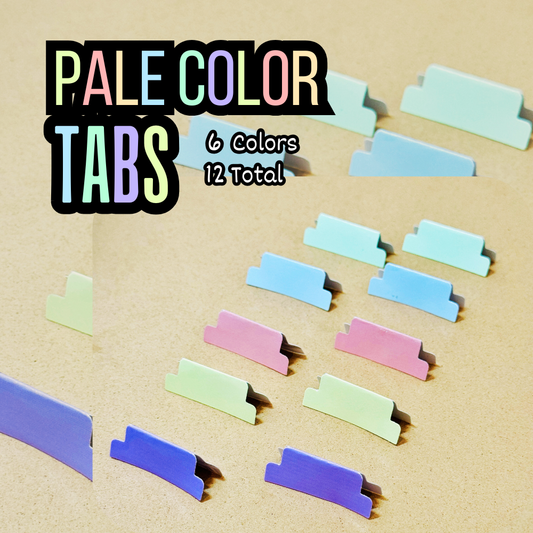 A collection of 12 sticker tabs in various pastel colors displayed on a beige surface with the text 'PALE COLOR TABS & 6 COLORS TOTAL' indicating the product's feature of multiple color options.