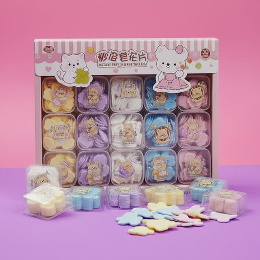 Cartoon-themed soap packaging on pink and purple background