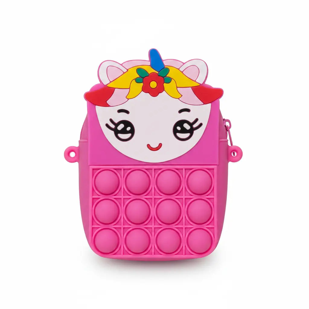 Pink pop-it toy with a unicorn face design on a white background