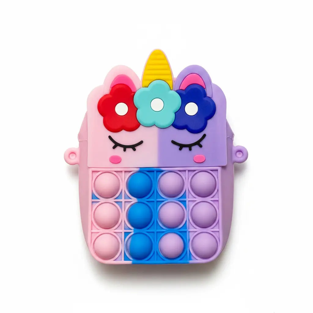 Colorful pop-it toy with unicorn design on a gray background