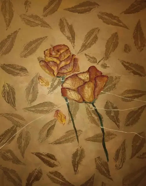 A close-up of a textured beige surface with a repeating pattern of brown leaves and two dried rose motifs in the center, tied with thin white threads.