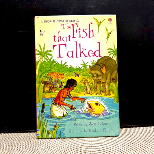 'The fish that talked' cover with a large fish in a pond and a boy standing next to it.