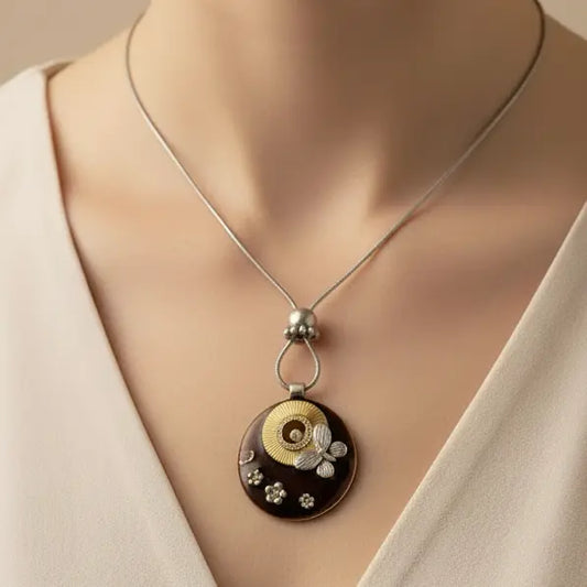 Necklace with a decorative pendant on a mannequin