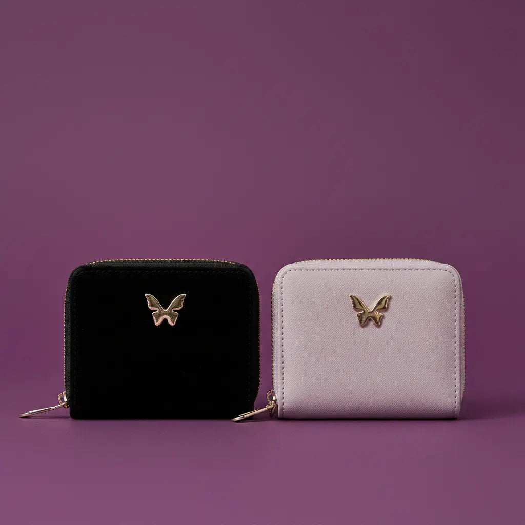 Black and gray wallets with butterfly emblem on a purple background