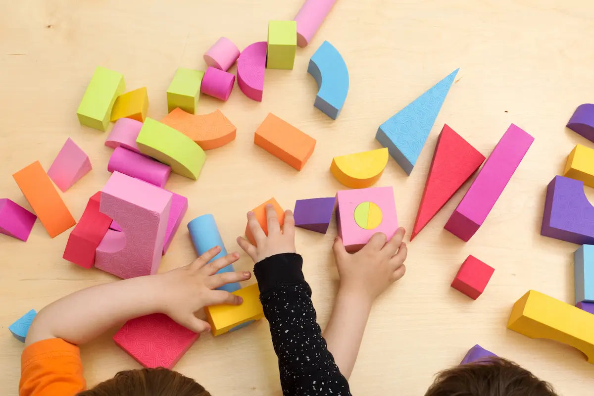 children-sharing-and-playing-with-toys