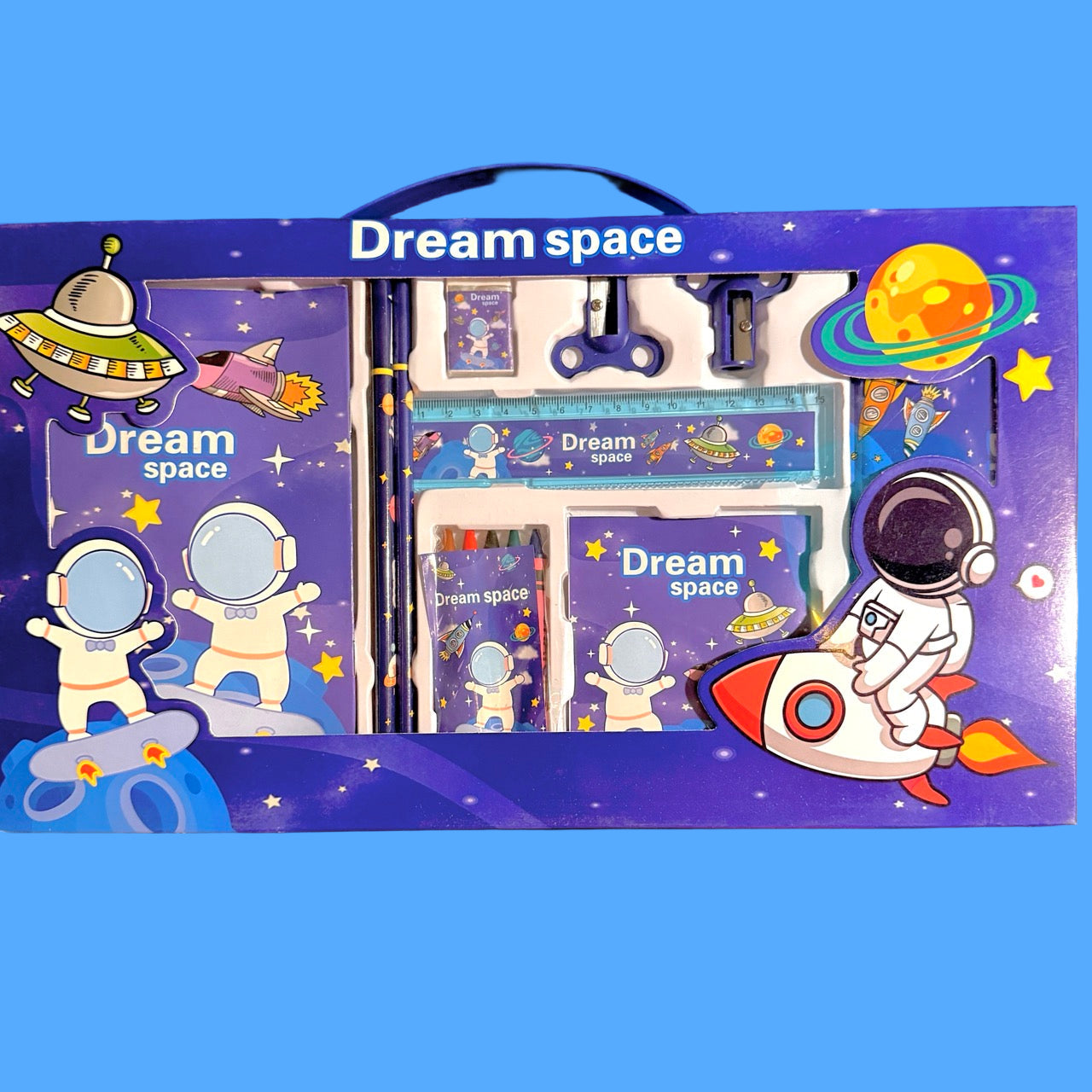 Space-themed stationery set with 'Dream space' branding on a blue background