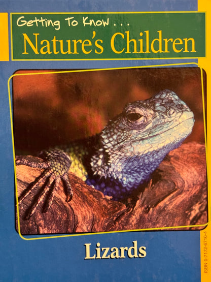 I picture of a lizard on a blue cover