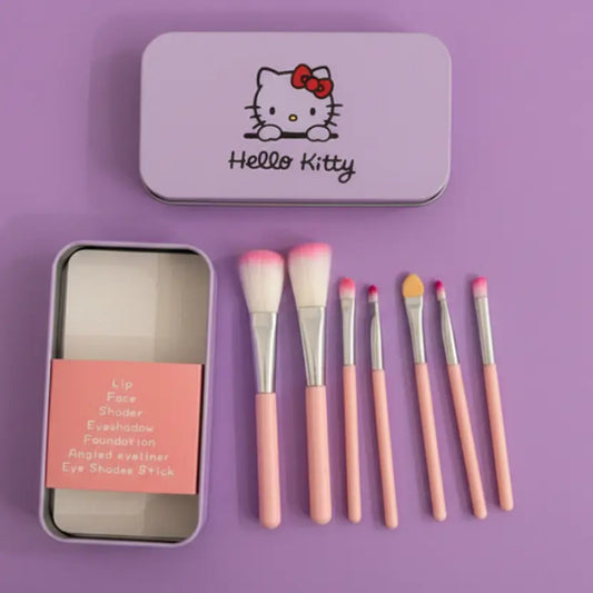Makeup brush set with 'Hello Kitty' tin on a purple background