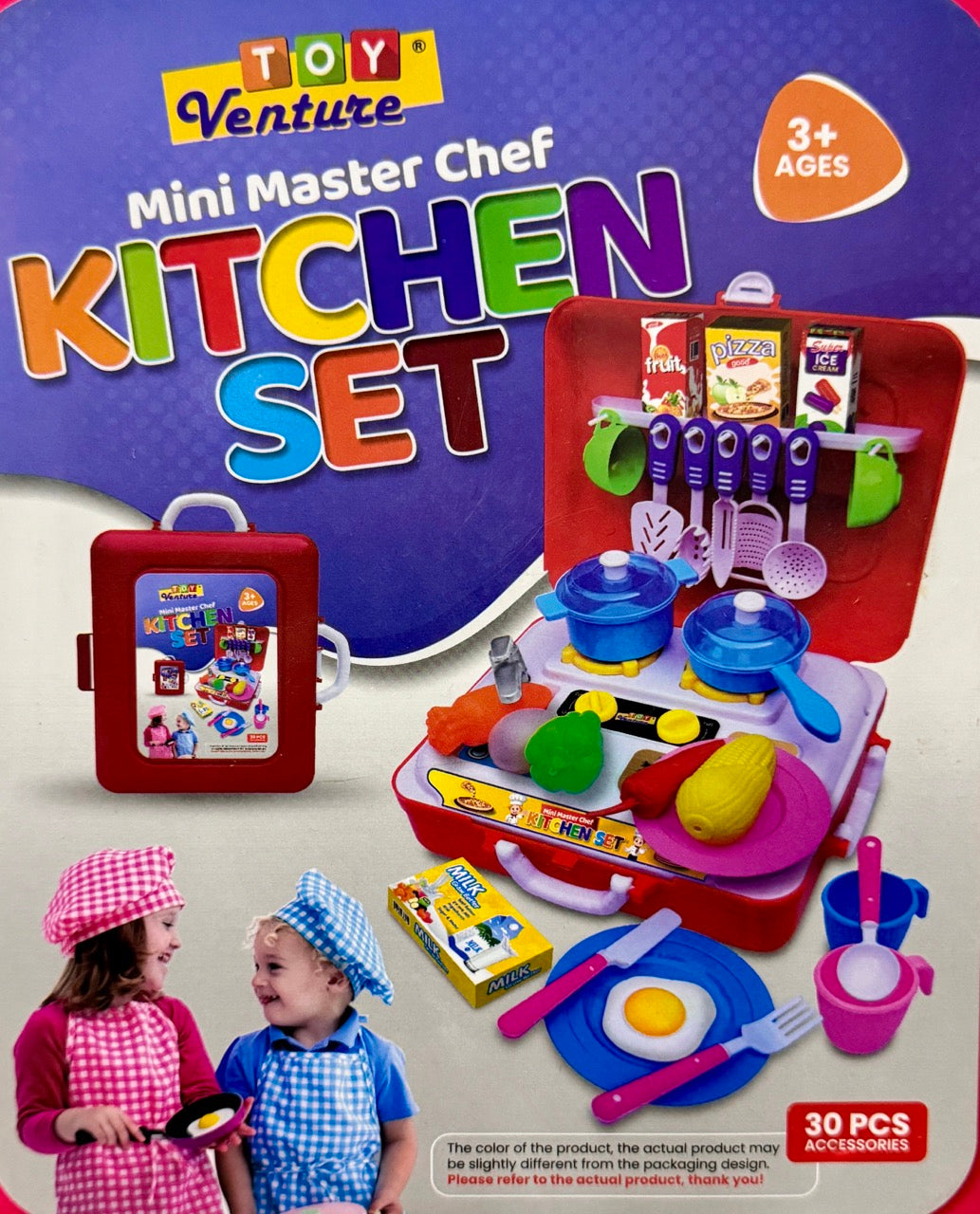 Toy kitchen set with children playing, featuring a red suitcase and colorful kitchen tools on a beige background.