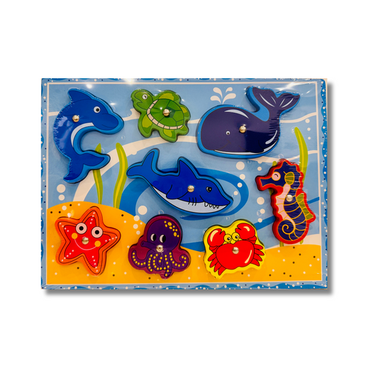 Set of colorful sea-themed wooden puzzles in a box
