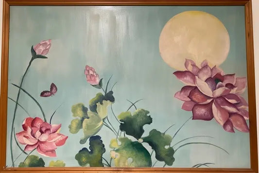 A framed painting depicting pink lotus flowers, green lotus leaves, a butterfly, and a large pale yellow moon on a soft light blue-green background.