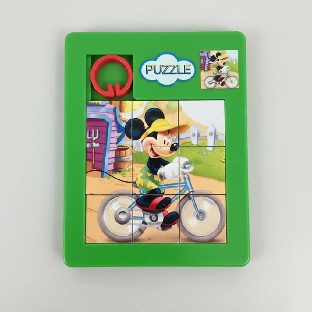 Children's puzzle with Mickey Mouse on a bike, featuring the brand 'Puzzle' on a green background.