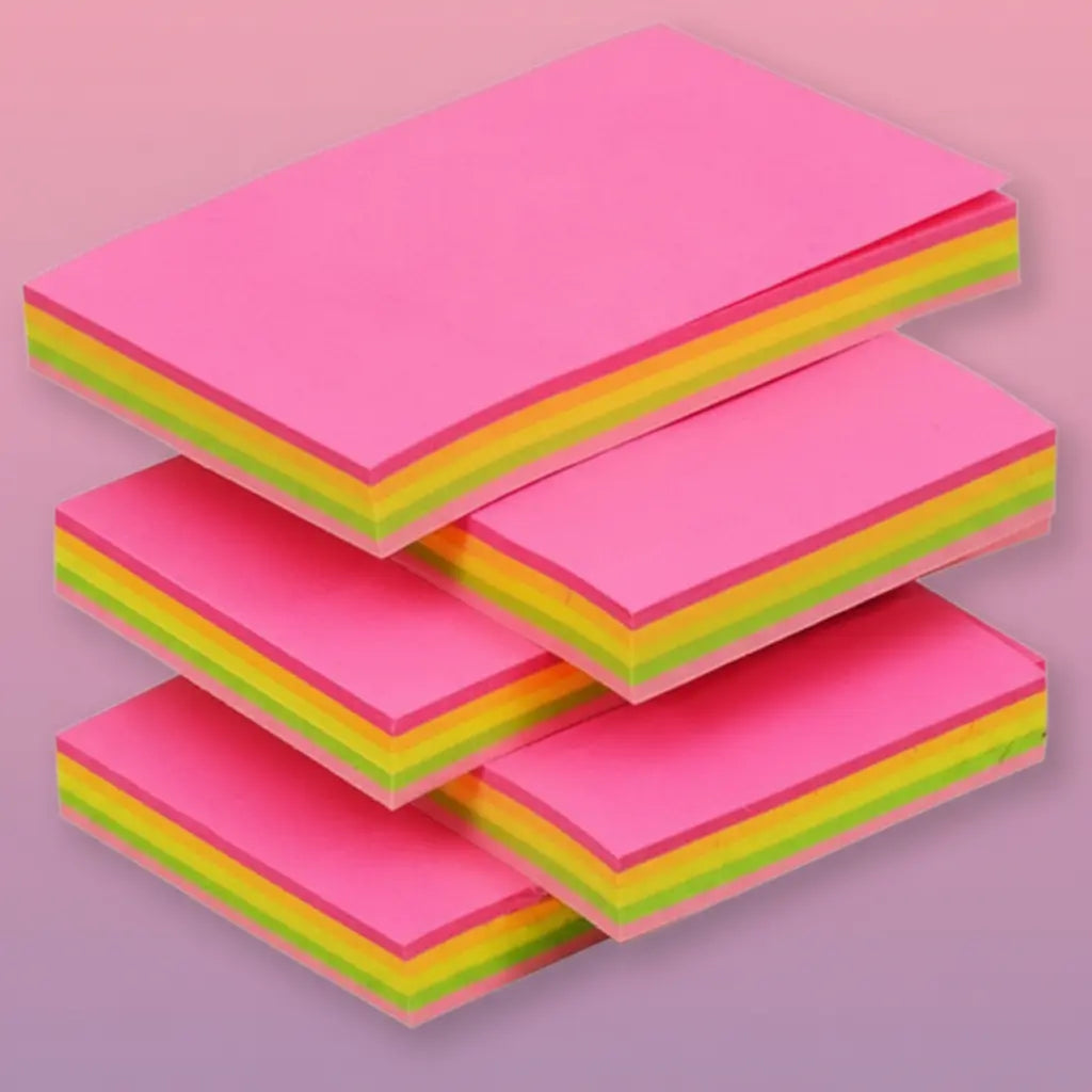 stack of multi colored sticky notes on a pink and purple background
