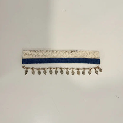 Necklace with blue band and leaf-shaped pendants on a white background