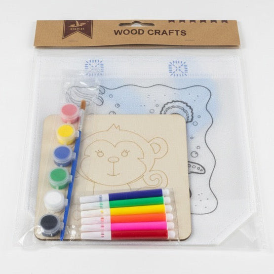 Wooden craft kit with markers and a template on a white surface